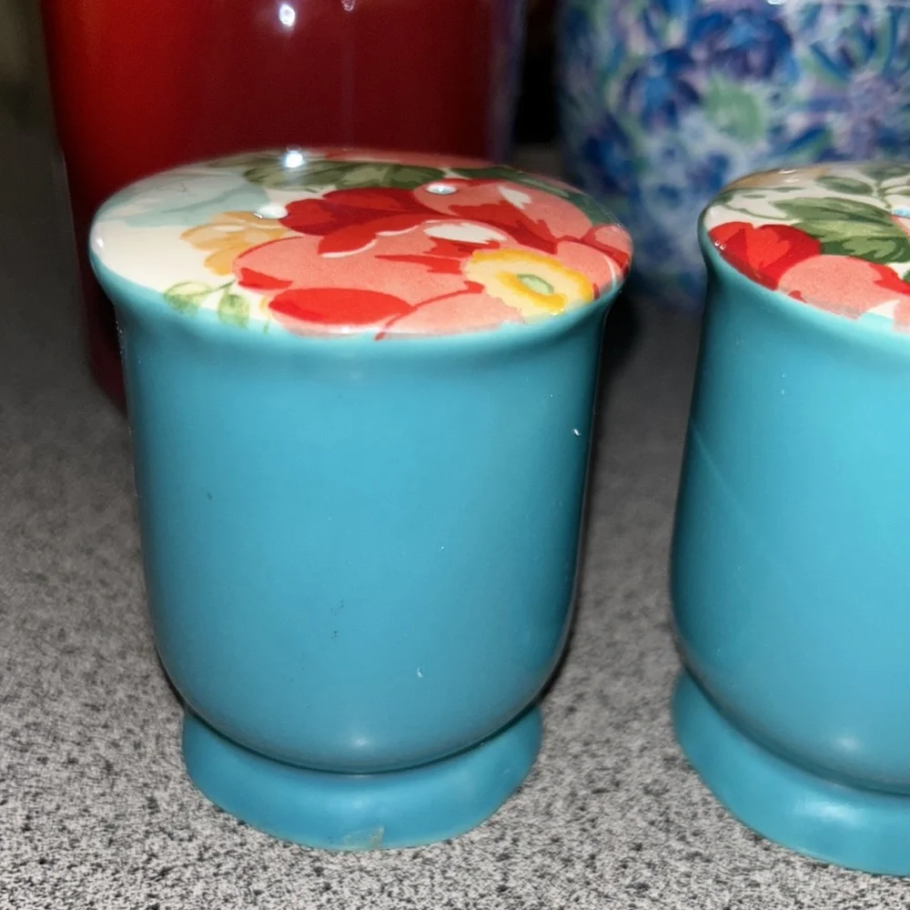 Pioneer Woman Salt and Pepper shakers with floral print top
